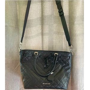 Michael kors cross body purse, can also be used as a regular purse.